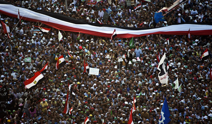 Supporters of
Egyptian president Mohammed Morsi and the Muslim Brotherhood
gather during a demonstration next to the Rabaa El-Adaweya mosque
in the capital Cairo, on June 28, 2013. (AFP Photo)